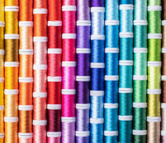 Colorful fabric and yarn samples produced by fabric manufacturers in the USA