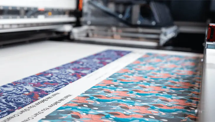 Professional digital fabric printing at Facto Textile, showing vibrant custom prints on our premium cotton quilting bases.